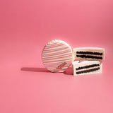 White Chocolate covered chocolate sandwich cookie by Little Cake Baker